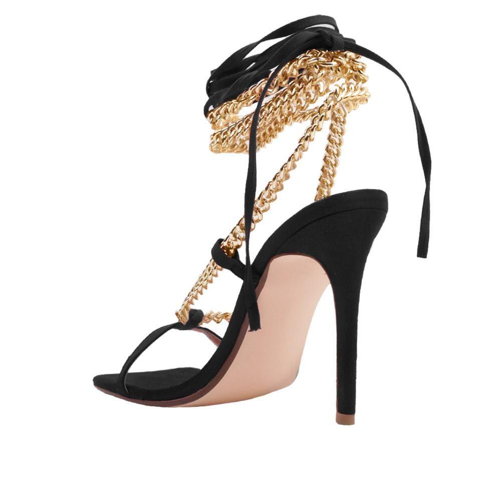 Women heels with gold metal chains and lace tie up in black-posterior view