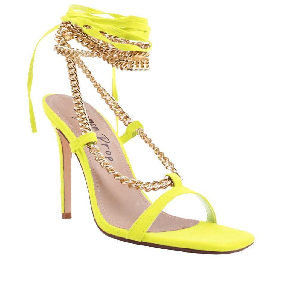 Women heels with gold metal chains and lace tie up in neon yellow-corner view