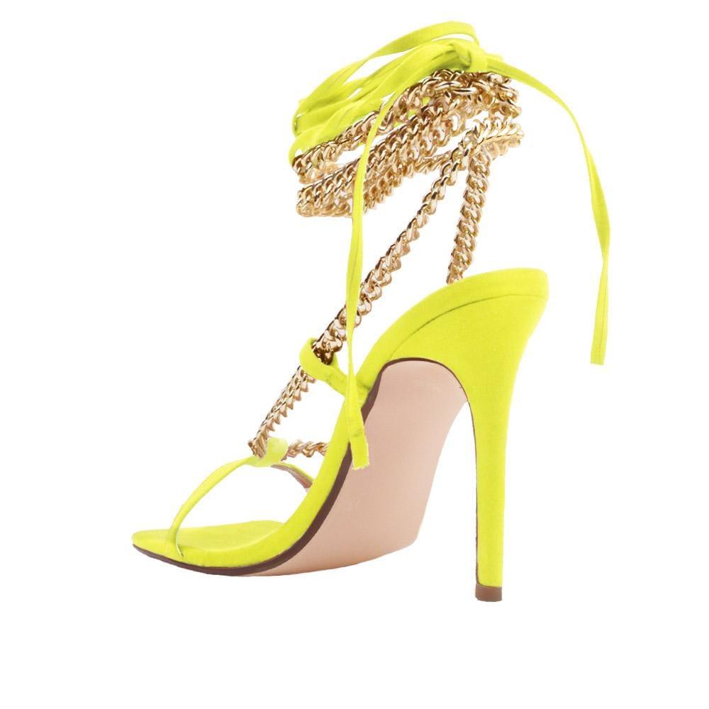 Women heels with gold metal chains and lace tie up in neon yellow-posterior view