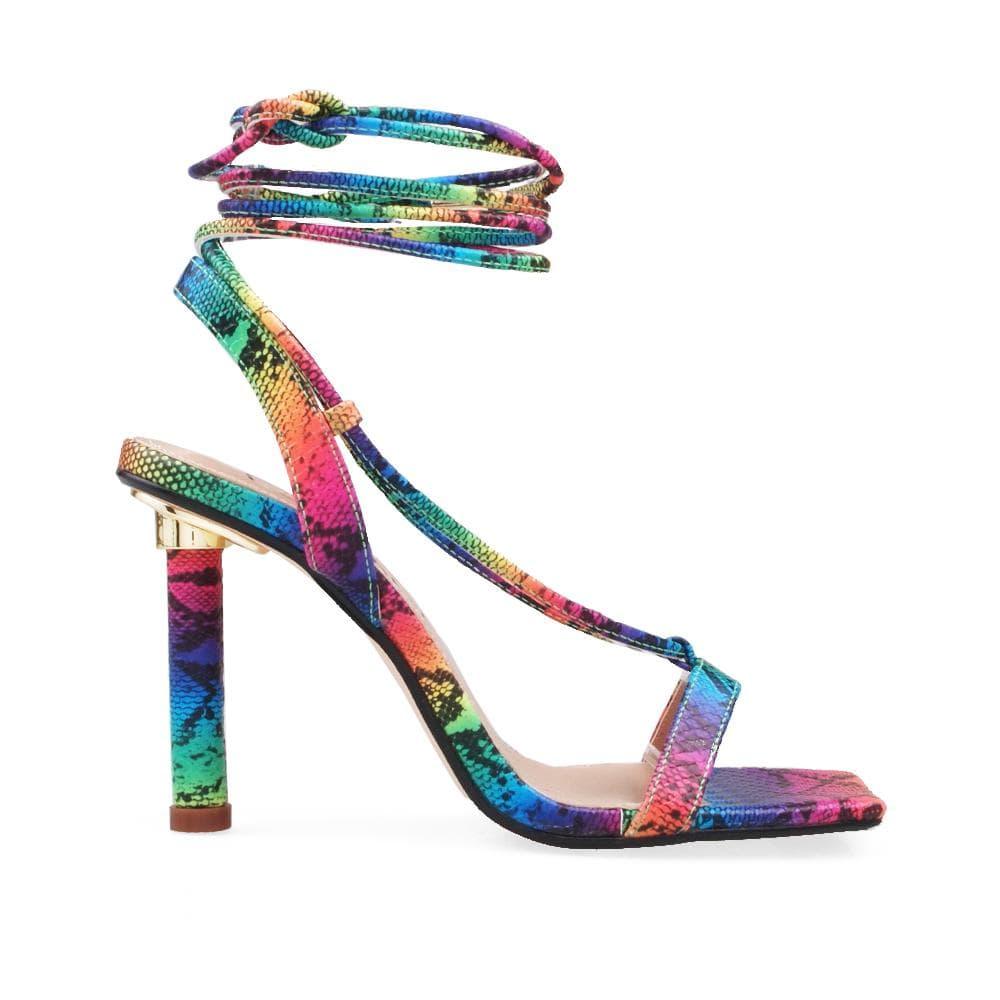 Stiletto heels in rainbow snake pattern with wraparound ankle, slander straps, and ankle lace closure.
