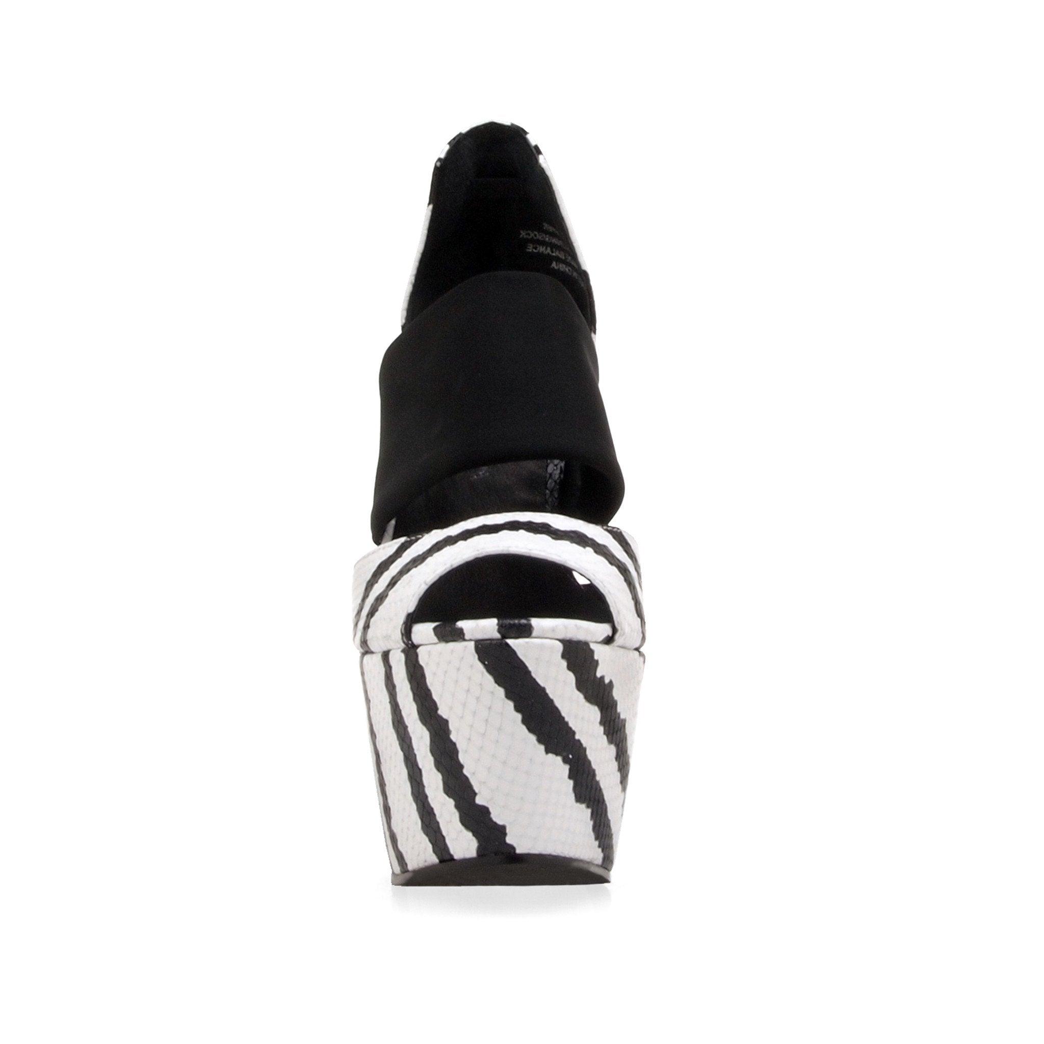 Black and white women's platform heel -front view