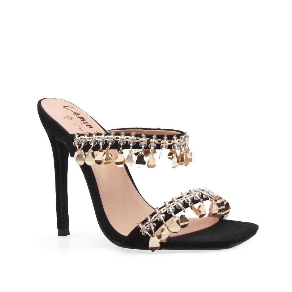 Black vegan patent leather women's heel embellished with gold metallic charms-corner view