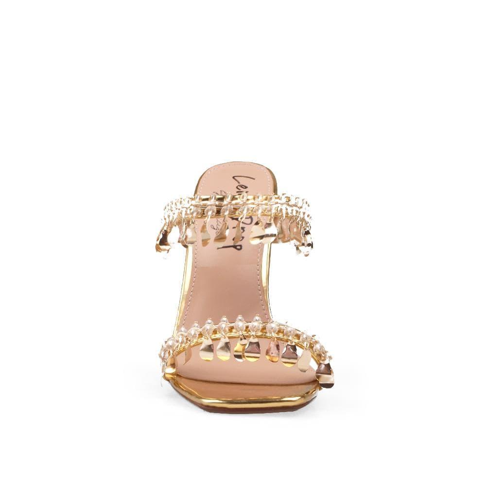 Gold vegan patent leather women's heel embellished with gold metallic charms-front view