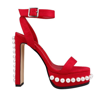 Red colored women heels with open toe and beads design on bottom - side view