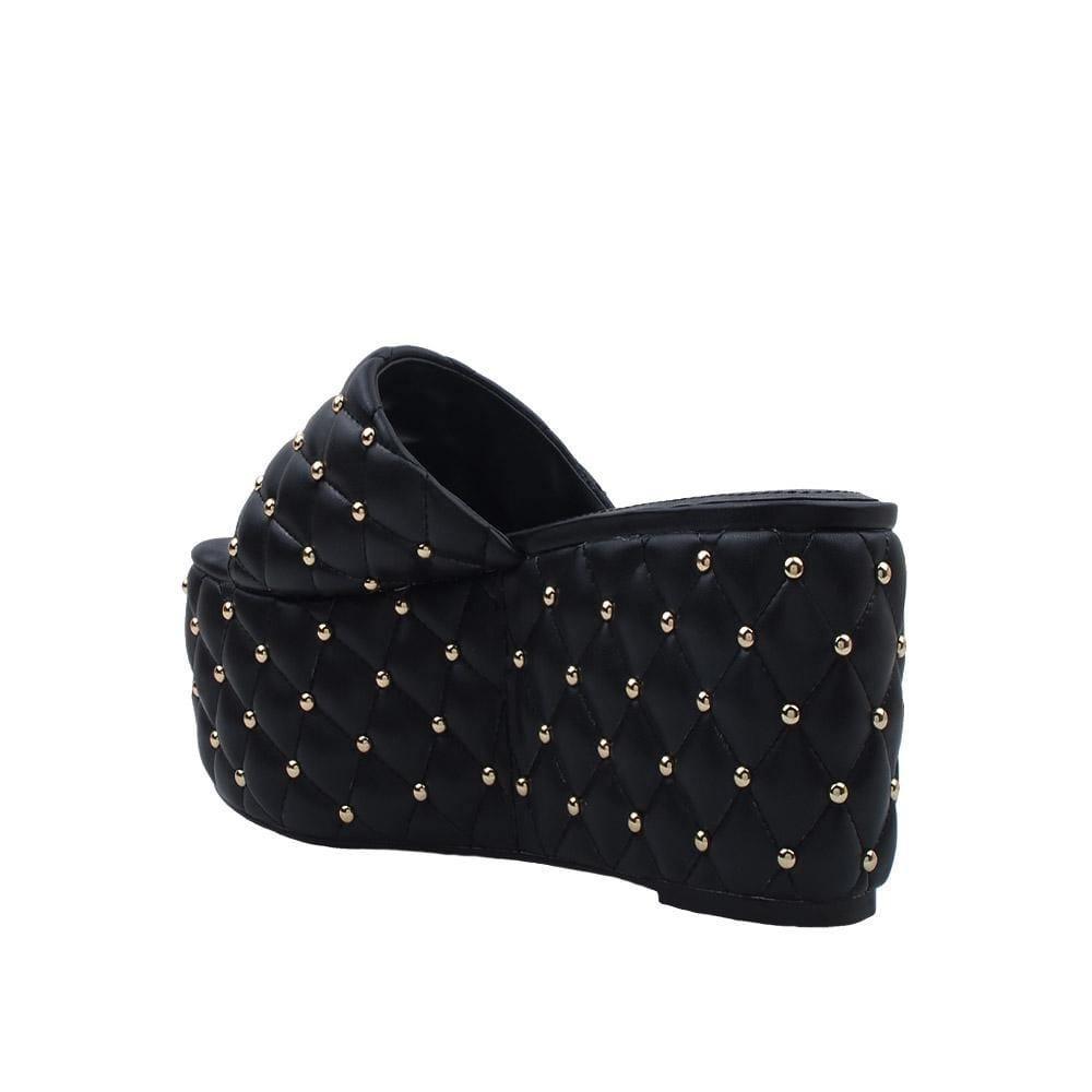 Black-colored open toed women's platform shoes with metallic studs and slip on style-posterior view