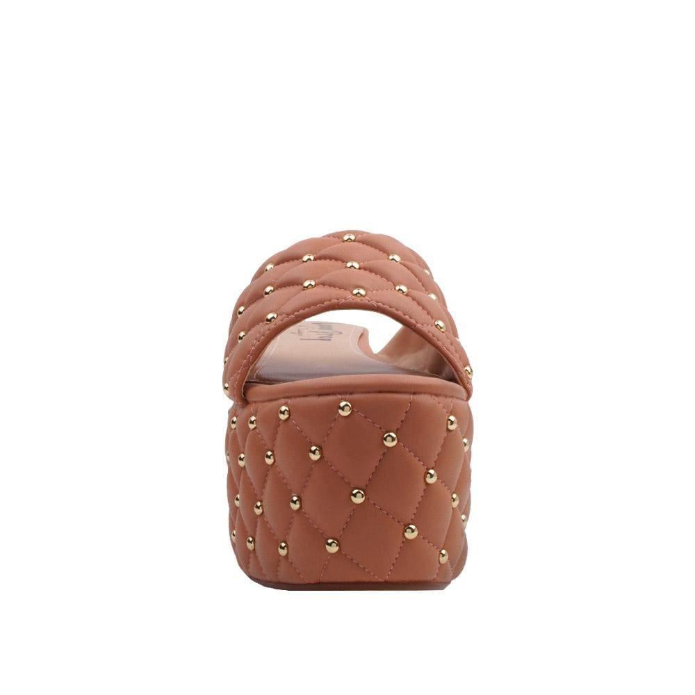 Women's tan-colored open-toed platform shoes with metallic studs and a slip-on design.-front view