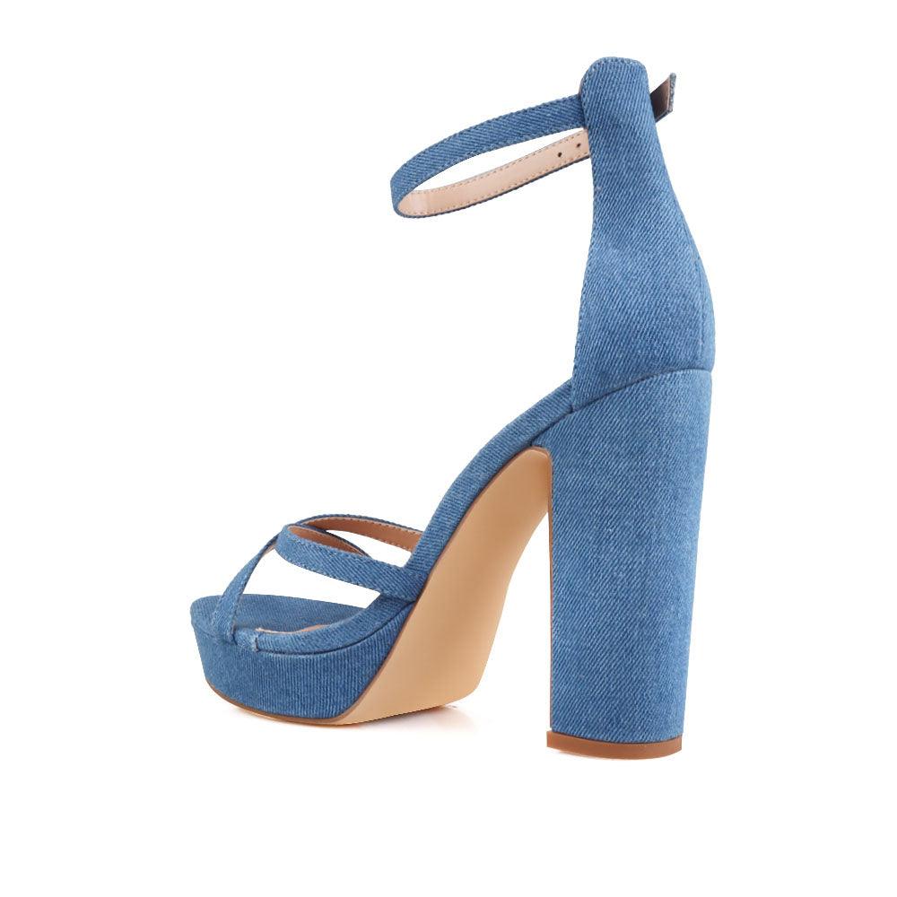 Denim platform heels with ankle buckle closure and open toe design - back view