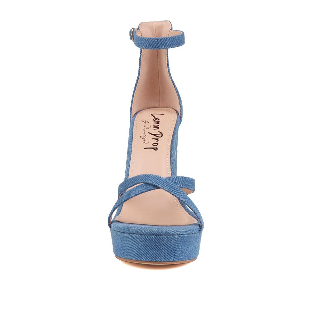 Denim platform heels with ankle buckle closure and open toe design - front view