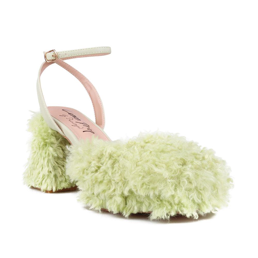 Green colored heel with vegan shearing upper-corner view