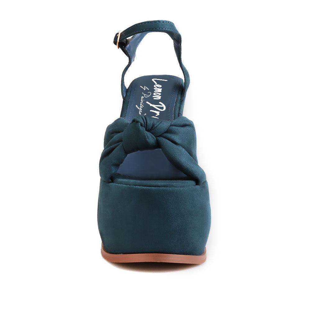 Suede dark green colored women's platform heels - front view