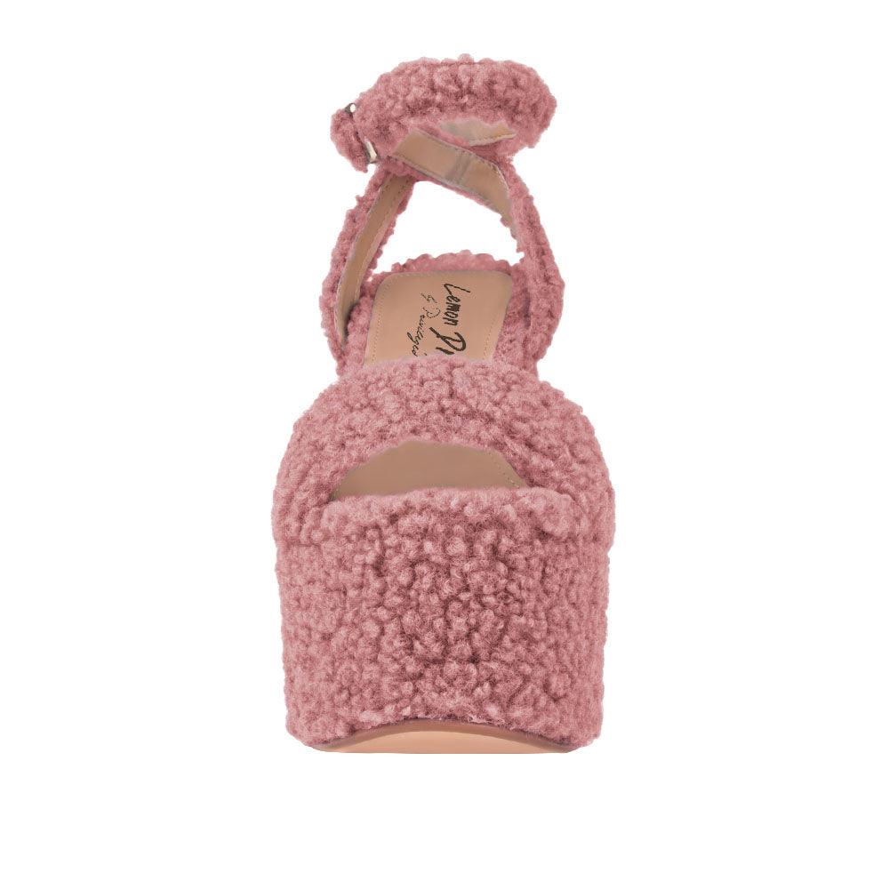 Blush shag covered women's platform heels-front view