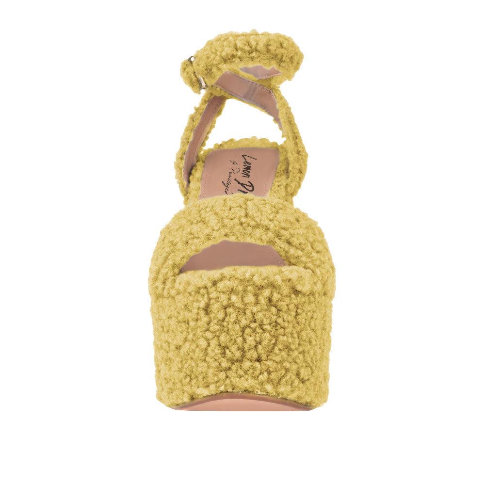 Yellow shag covered women's platform heels-front view