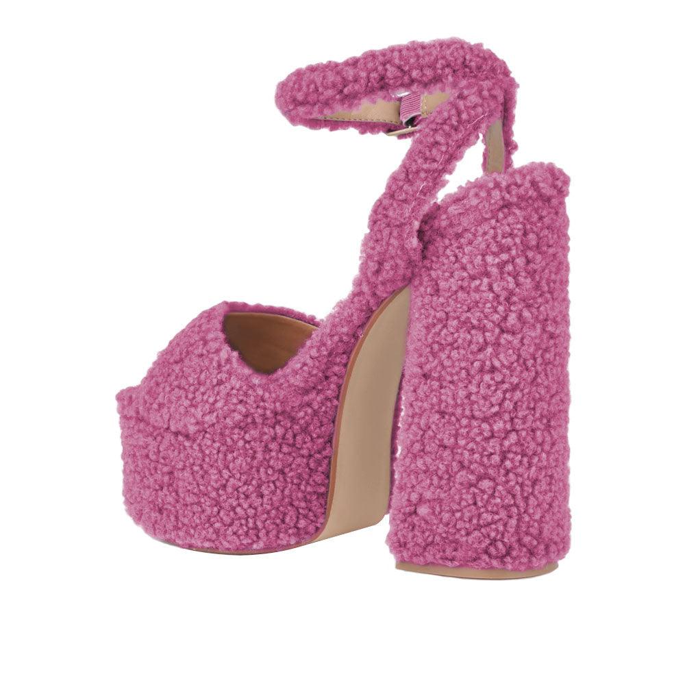 Fuchsia shag covered women's platform heels -posterior view