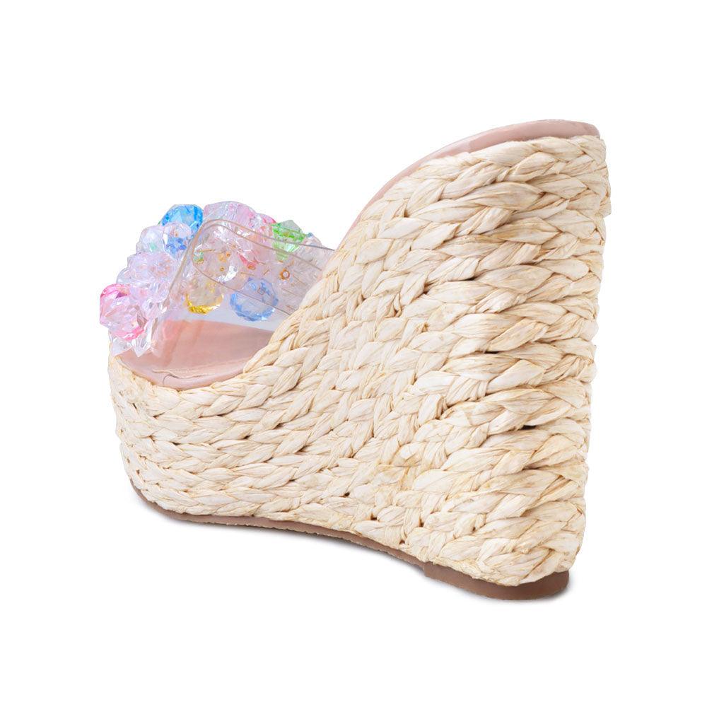 Clear vinyl upper with rhinestones women's slip on platform heel in nude-posterior view