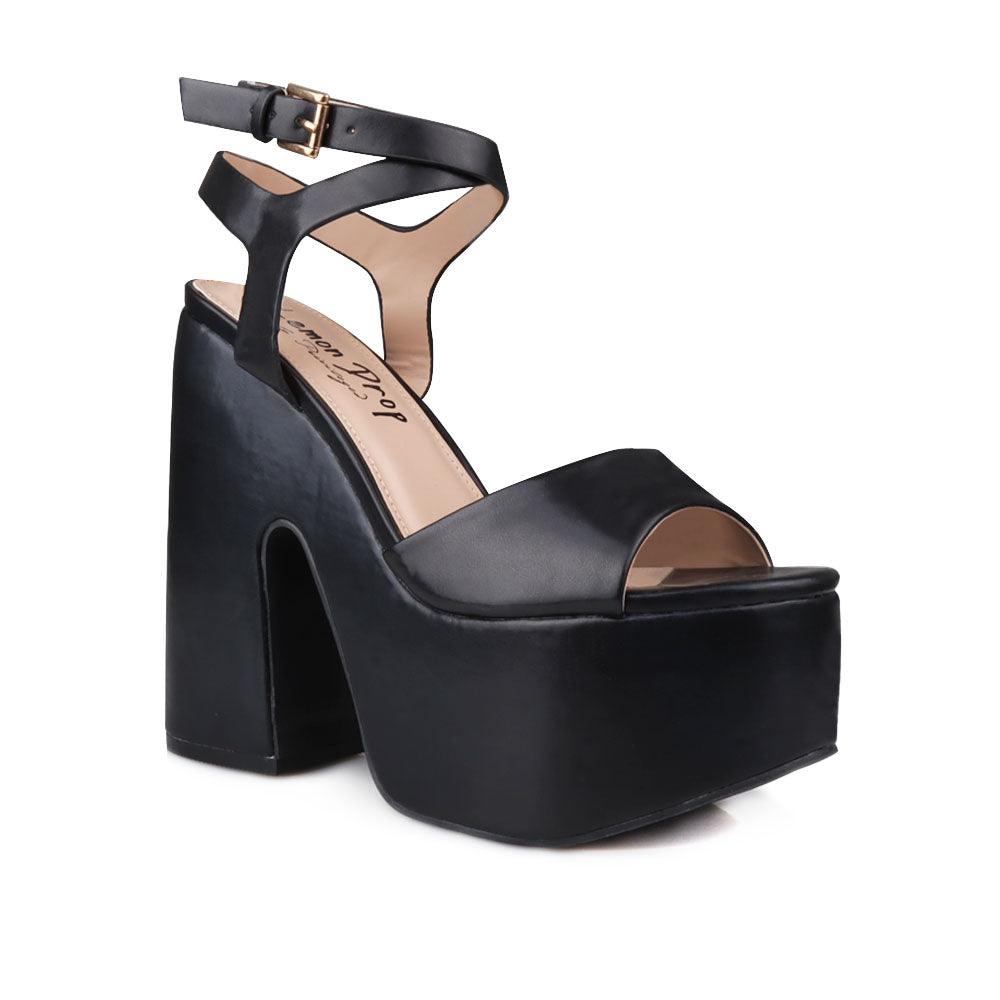 Black leather women's block heel with platform-corner view