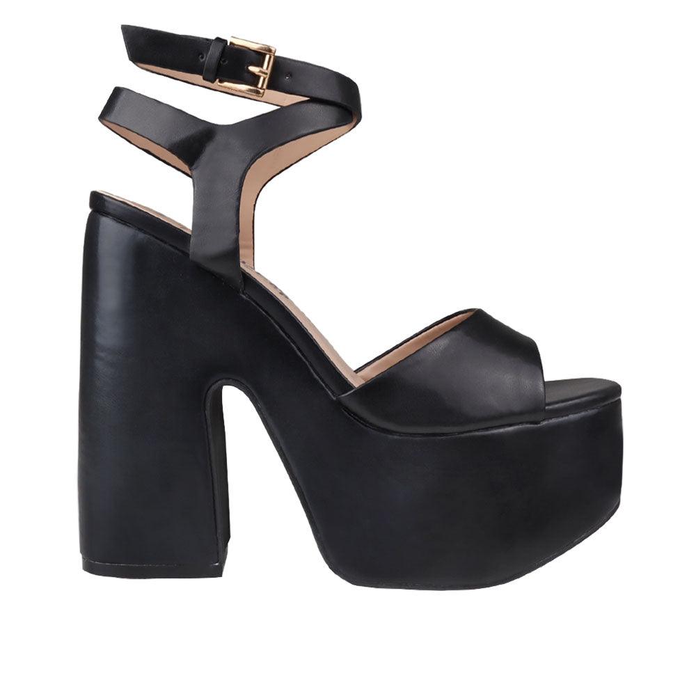 Black leather women's block heel with platform-side view