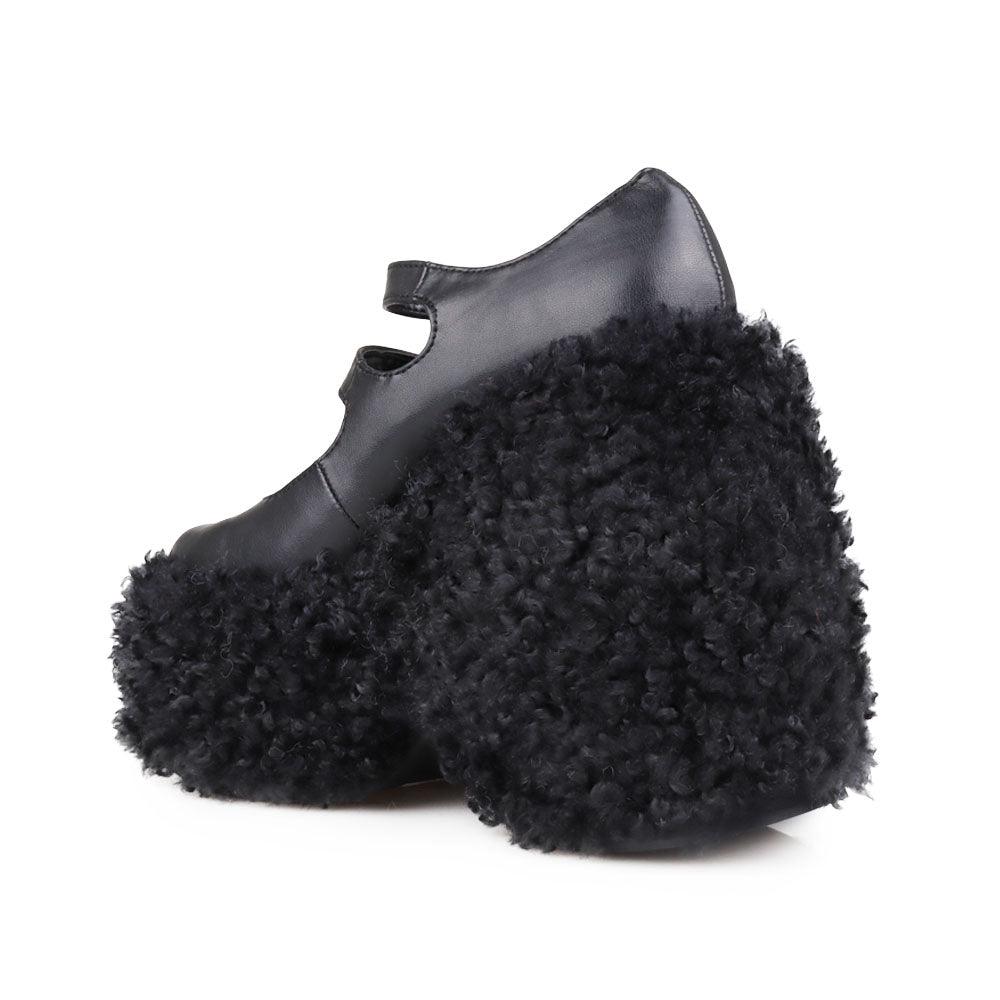 Women's shaggy wedge heel in black-posterior view