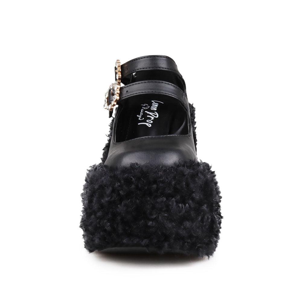Women's shaggy wedge heel in black-front view