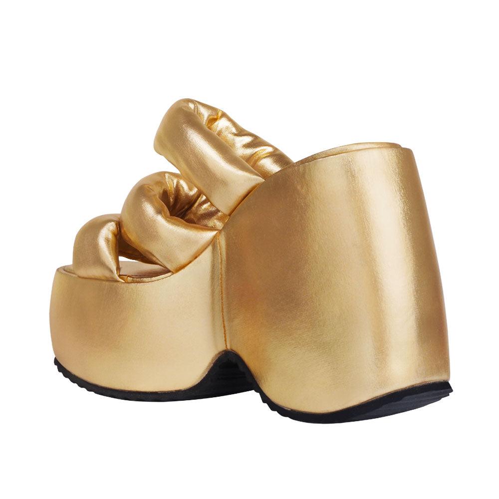 Textiled upper platform women's heel in gold-posterior view