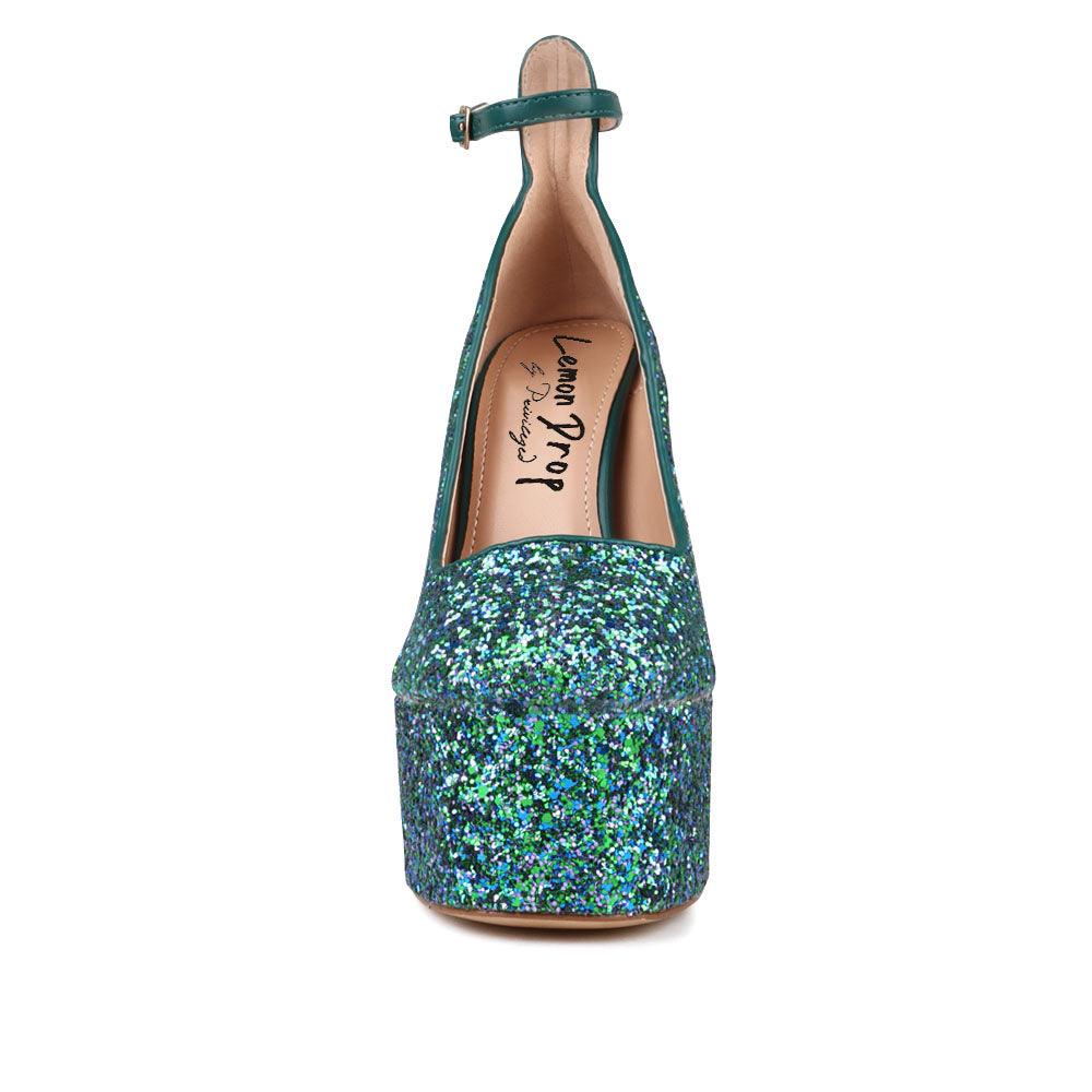 Green colored women platforms with ankle buckle closure-front view