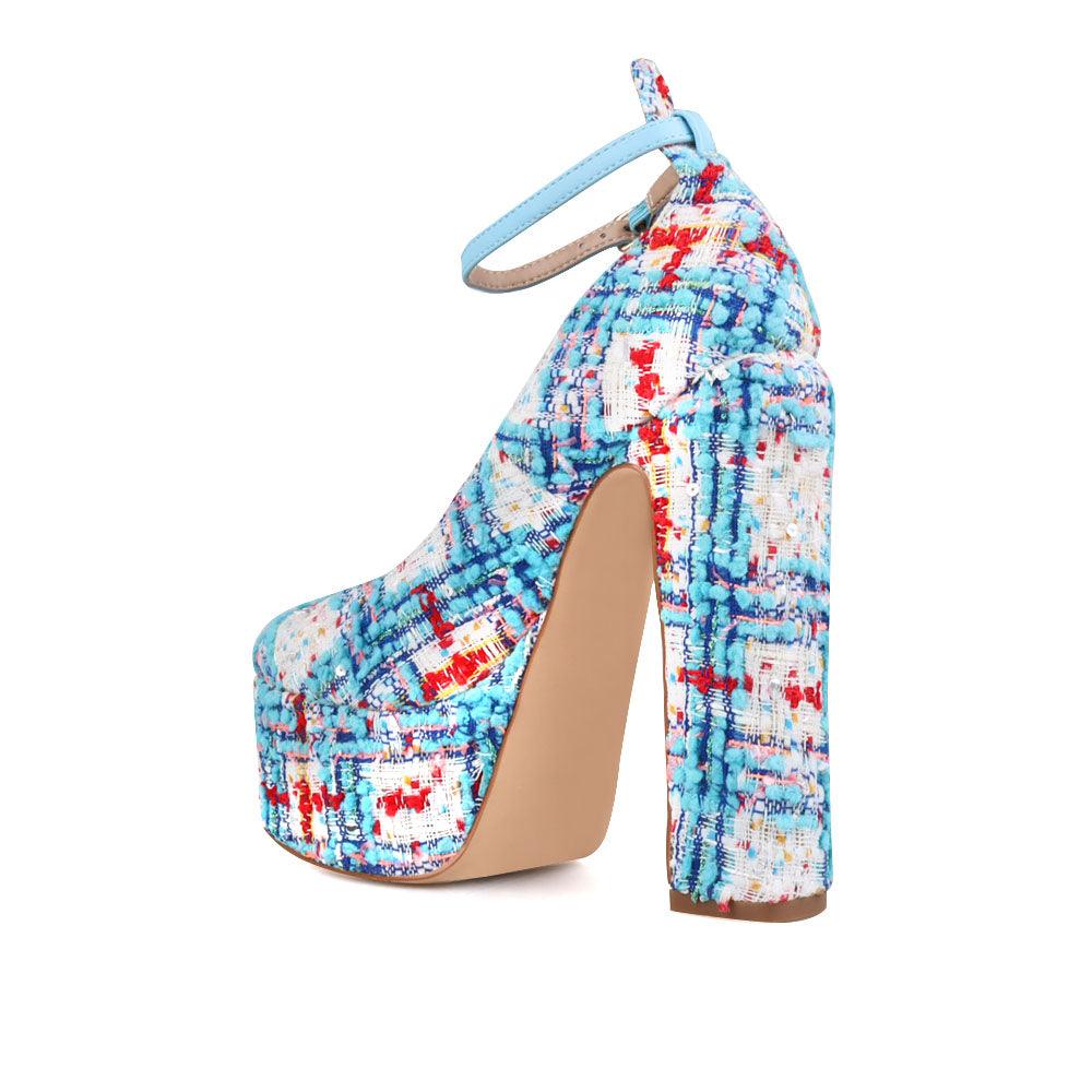 Blue and white colored women platforms with ankle buckle closure-posterior view