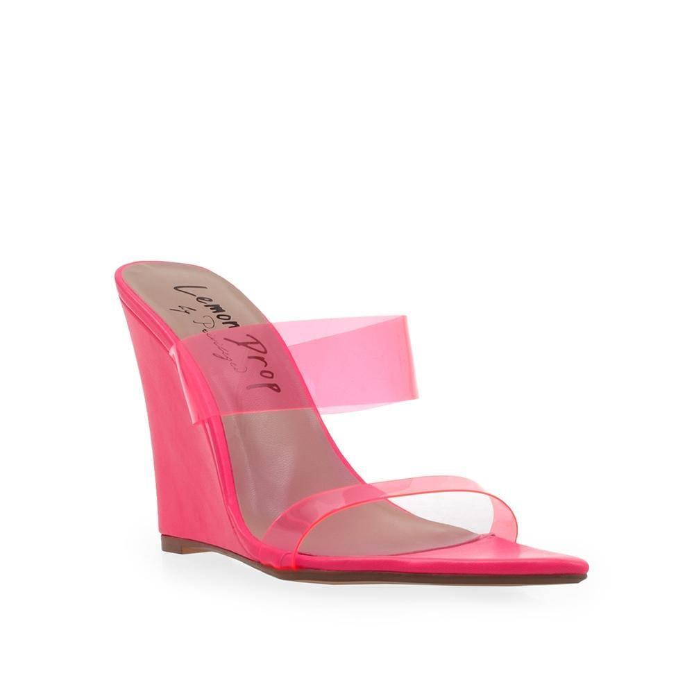 Pink colored women heels with vinyl upper strap
