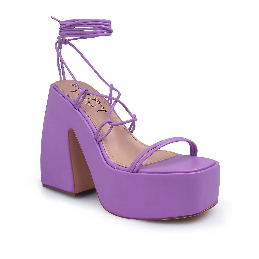 Purple colored strappy platform heeled sandals - corner view