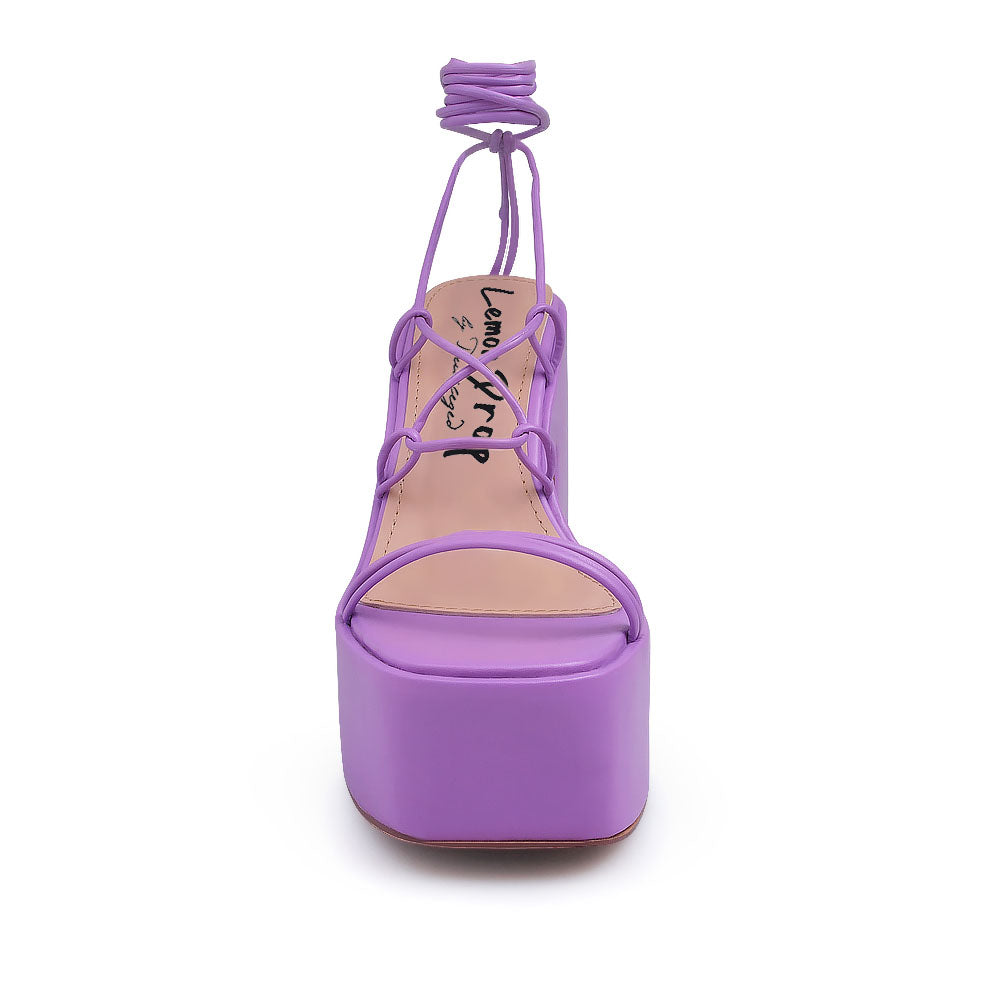 Purple colored strappy platform heeled sandals - front view