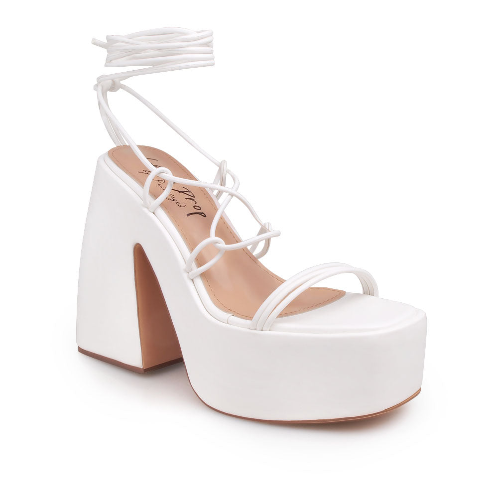 White colored strappy platform heeled sandals - corner  view