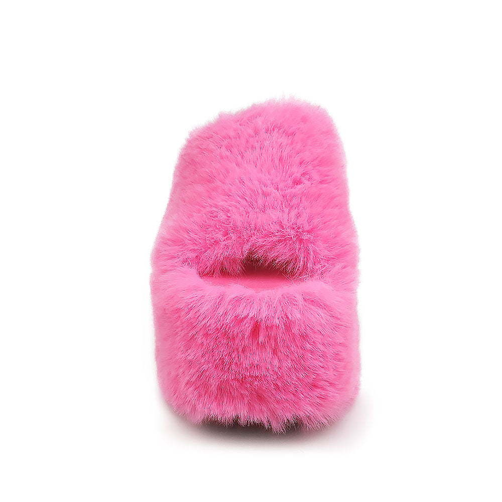 Pink furry platform sandals with open toe - front view