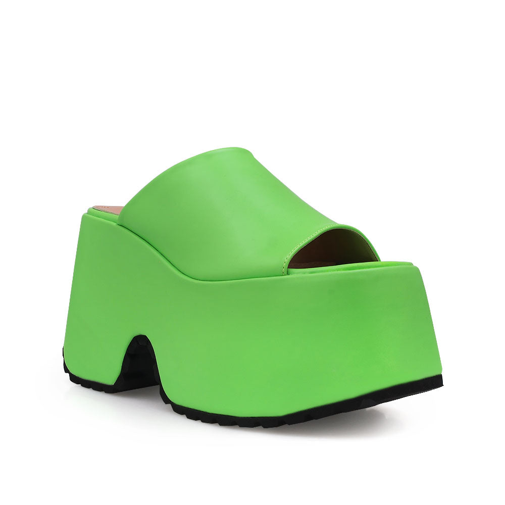 Lime colored platforms with open toe and slip-on design - corner view