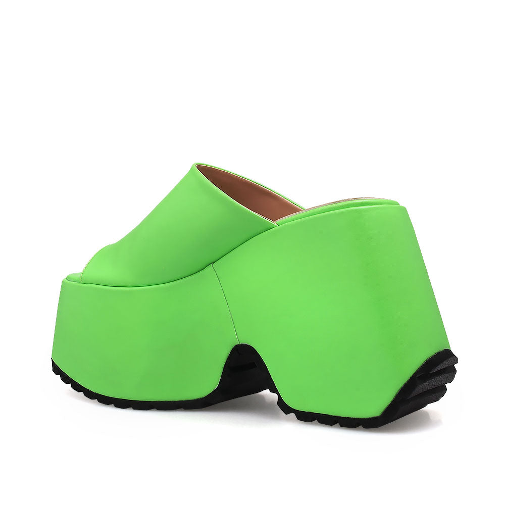 Lime colored platforms with open toe and slip-on design - back view