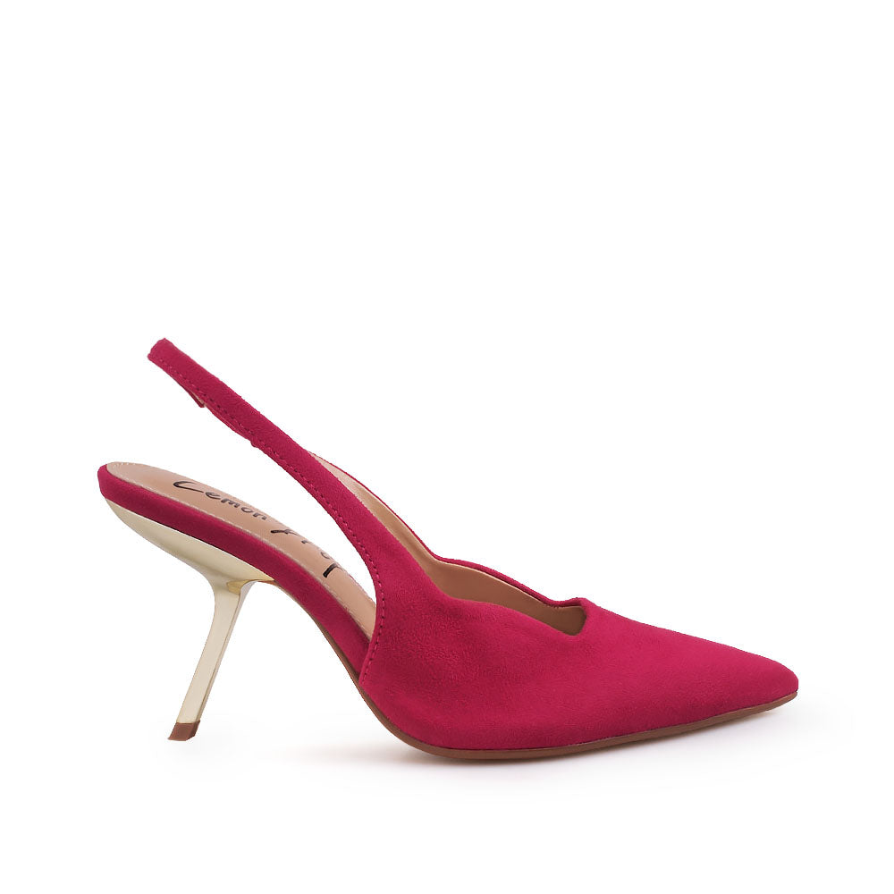 Fuchsia colored stiletto heels with pointed toe and ankle buckle closure - side view