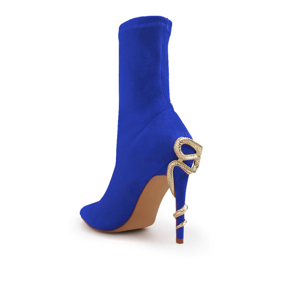 Blue pointed toe stiletto heels boots with snake design on heels - back view 