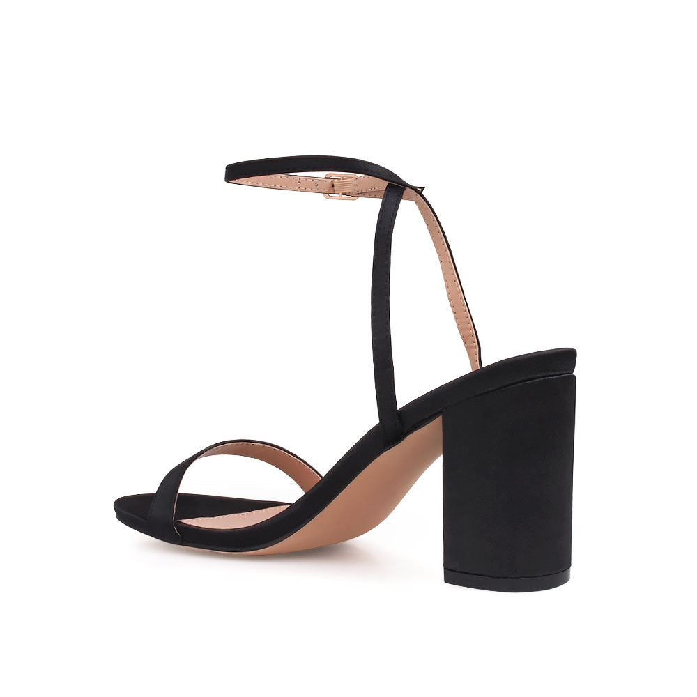 Open toe block heel sandals with ankle buckle closure in black color - back view