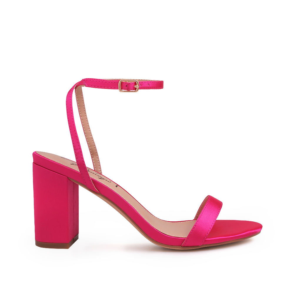 Open toe block heel sandals with ankle buckle closure in fuchsia color - side view