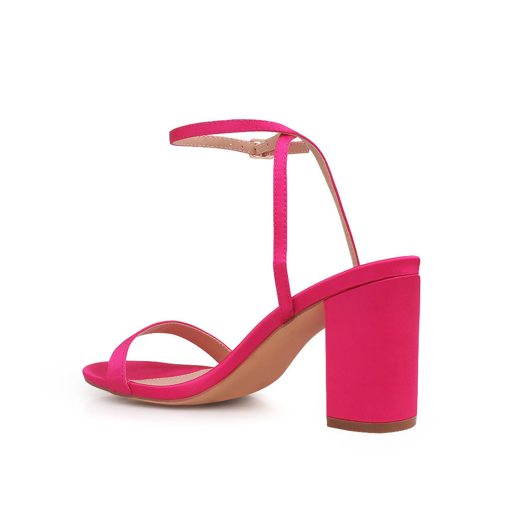 Open toe block heel sandals with ankle buckle closure in fuchsia color - back view