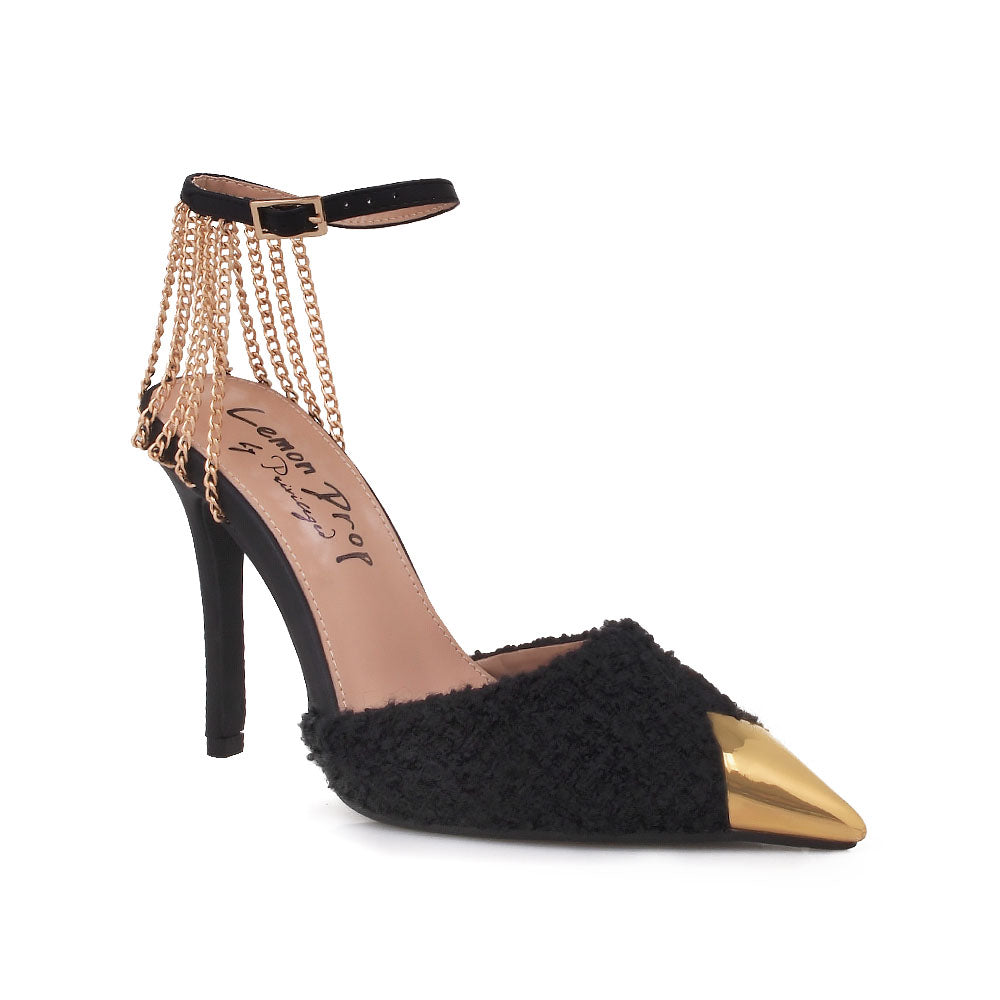 Black stiletto heels with gold chain accents and ankle buckle closure - corner view