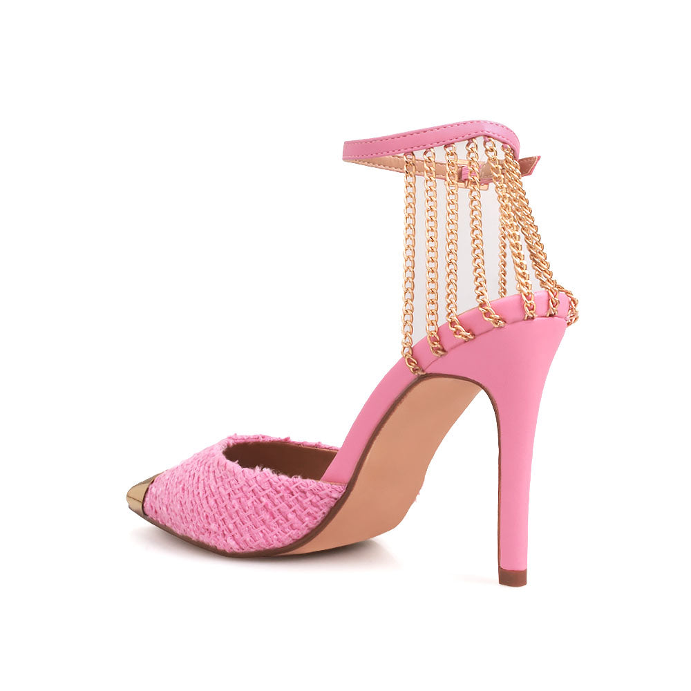 Pink stiletto heels with golden chain accent and ankle buckle closure - back view