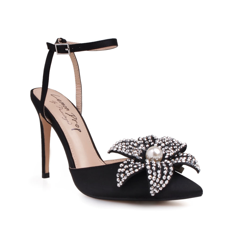 Black stiletto heel with flower pearl embellished upper and ankle strap closure - corner view