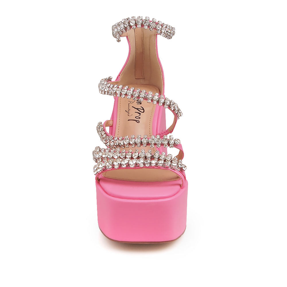 Pink platform sandals with crystal embellished straps - front view