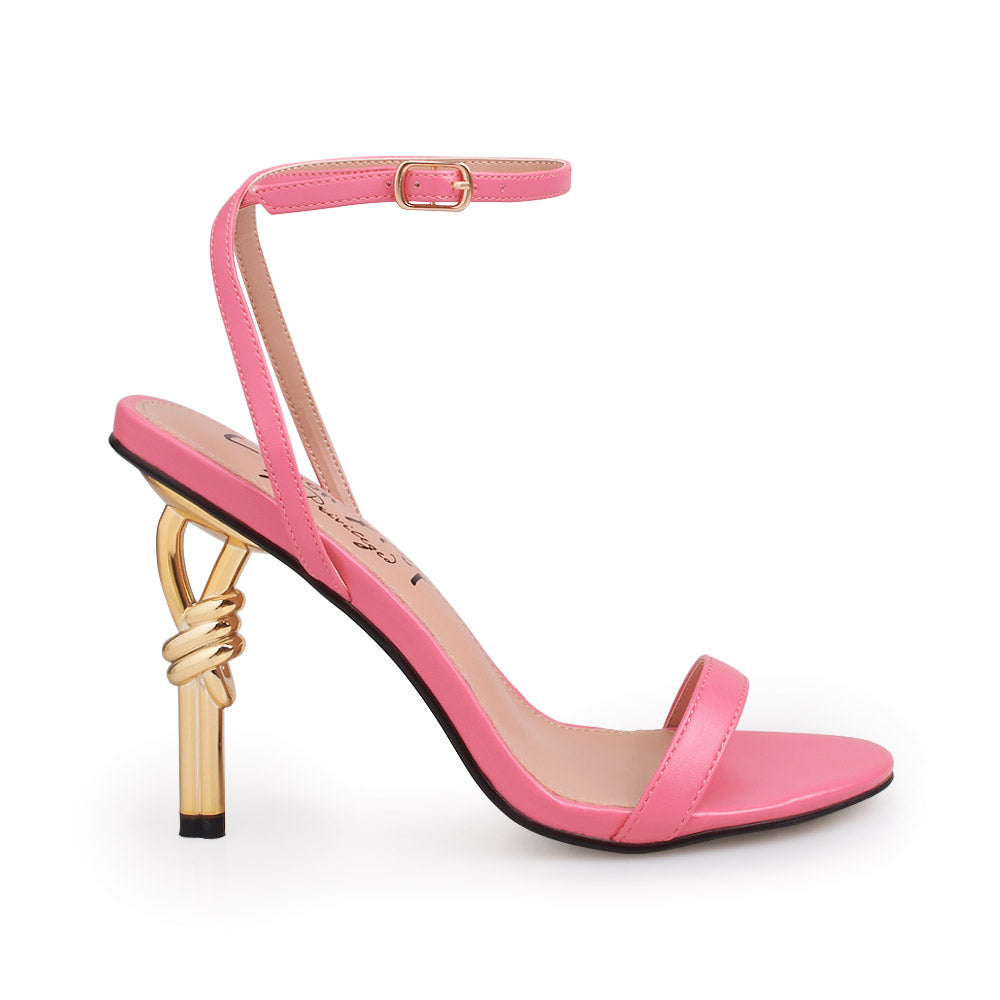 Coral color upper and ankle buckle closure on gold metallic heels - side view