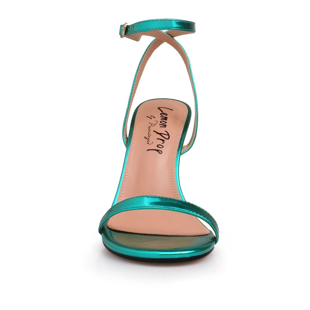 Gold colored metallic heels with teal upper and ankle buckle closure - front view