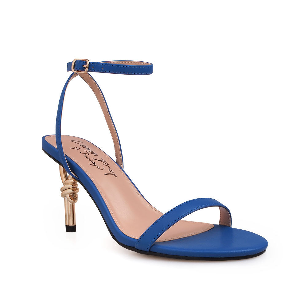 Golden Knot metallic heels with blue upper and ankle strap closure - corner view