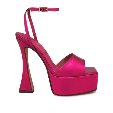 Fuchsia colored open toe platform heels with ankle strap closure - side view