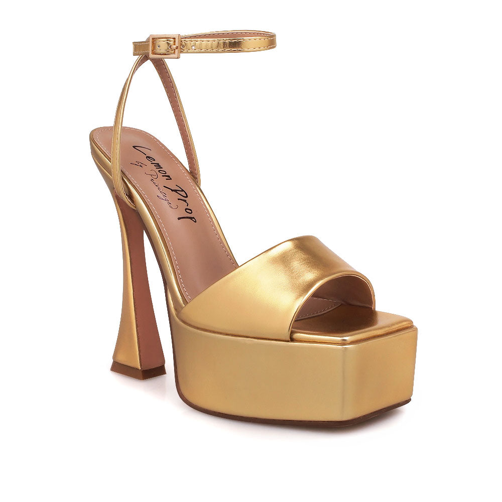 Golden platform heels with open toe and ankle buckle closure - corner view