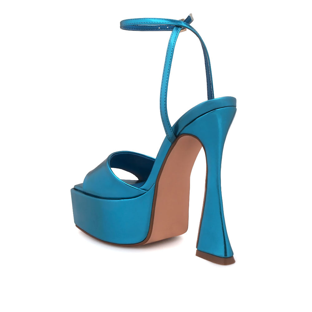 Turquoise platform heels with open toe and ankle buckle closure - back view