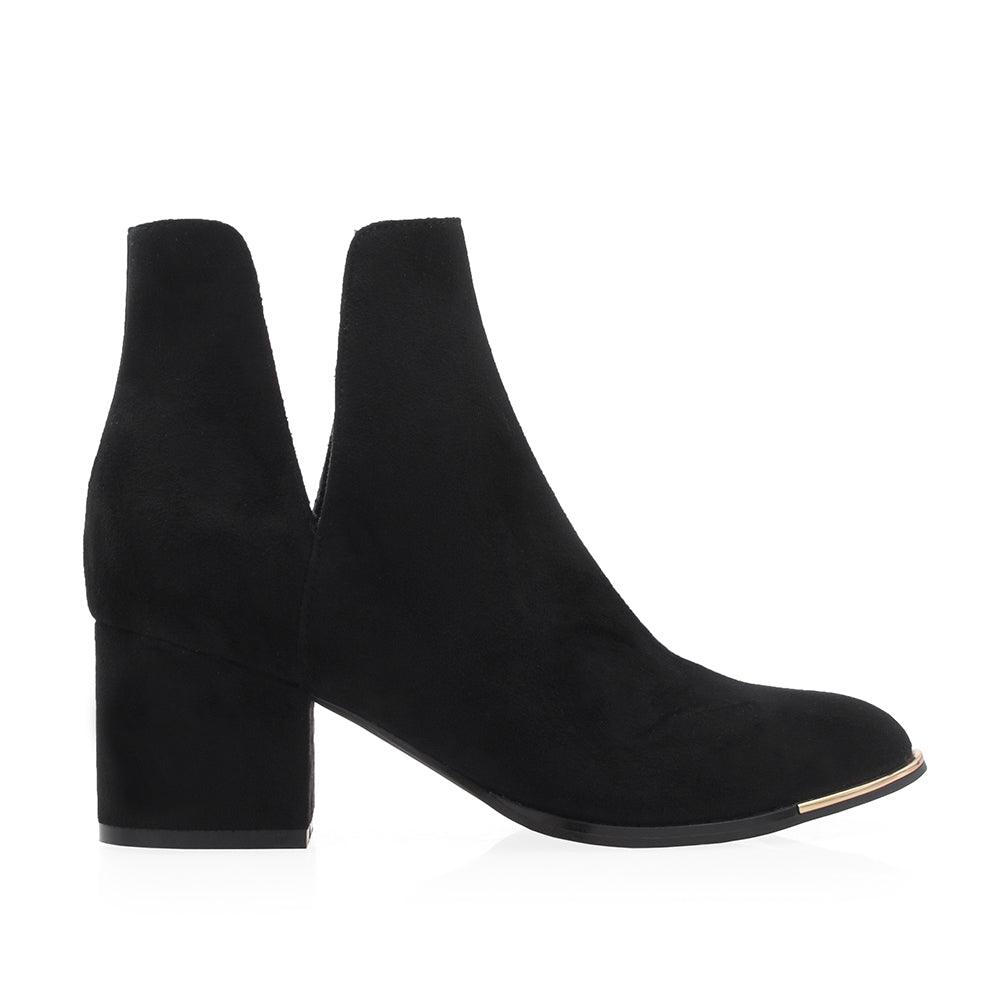 Ankle boots in Black with block heels and open sides - side view