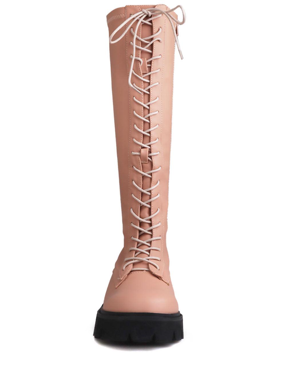 Women's nude-colored knee high boots with a lace up closure-front view