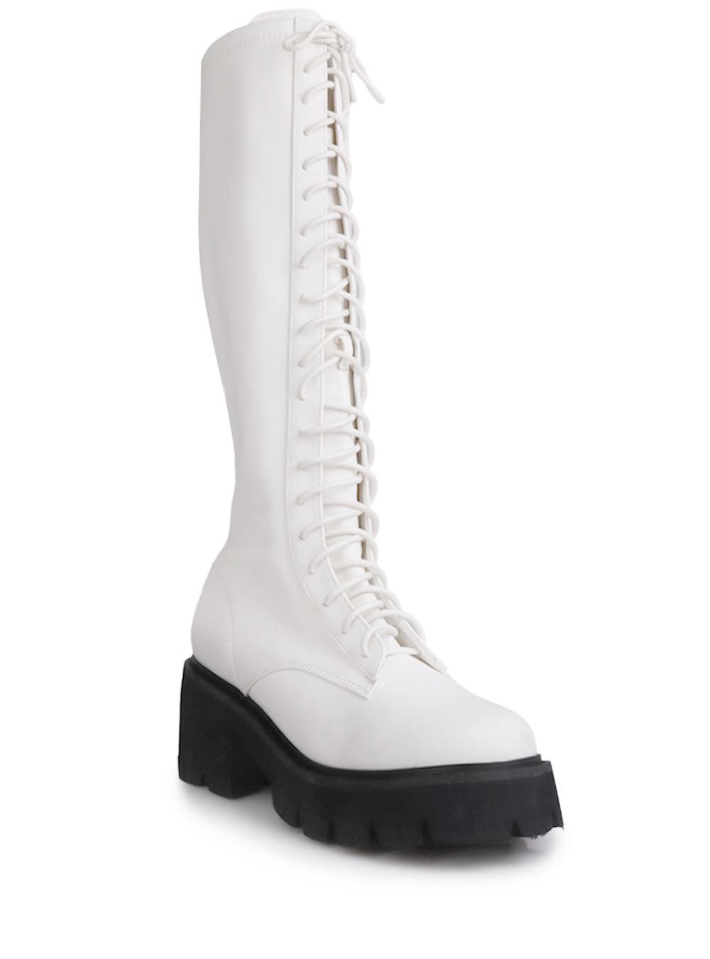 Women's white-colored knee high boots with lace up closure and black bottom-corner view